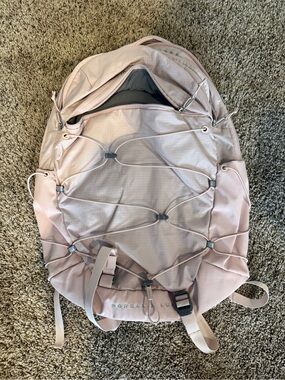 backpack in between osprey xs and s Women's Tempest 24 XS/S modern backpack small stash pocket Mini Backpack with Embossed Color:Onyx
